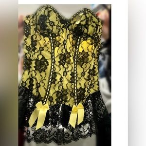 Sexy, Fredericks of Hollywood corset, with Moulin Rouge vibes.